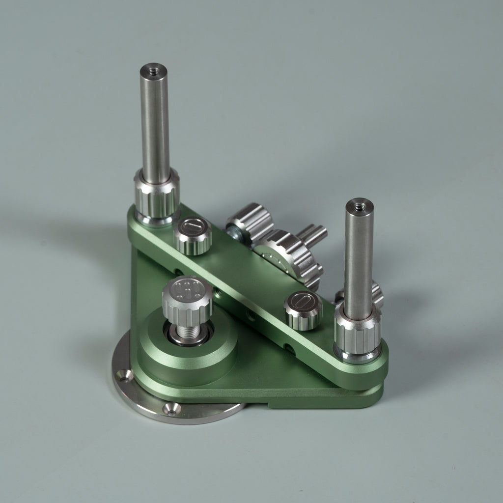 Green router circle-cutting jig with raised guide posts, indexed knobs, and base plate