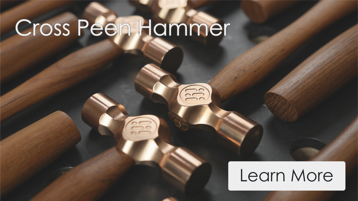 Set of cross peen hammers with brass heads and wooden handles