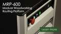 Modular routing platform front controls with red knob, green light, and metal guide rail