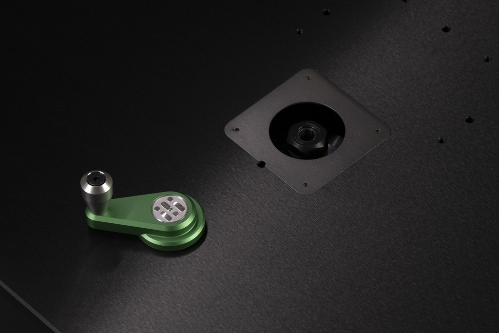 Modular routing platform worktable with circular mounting insert and green accessory tool