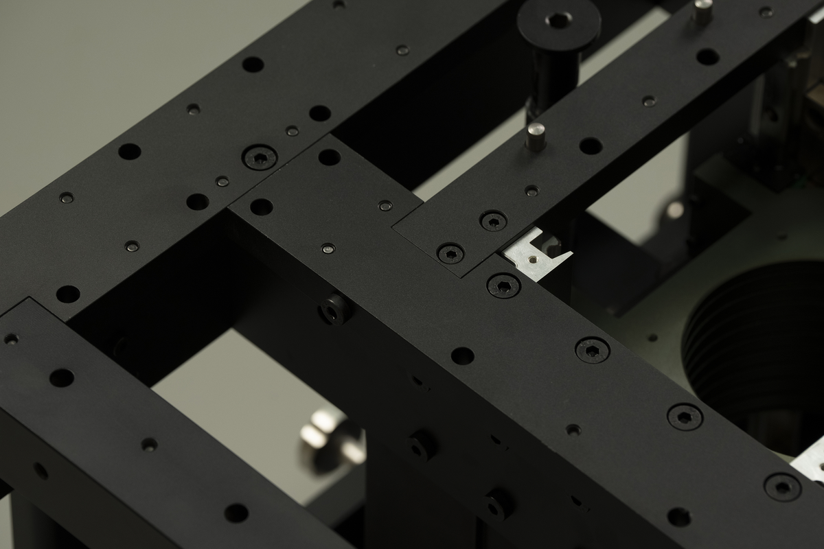 Modular routing platform rail assembly with adjustment slots and metal hardware
